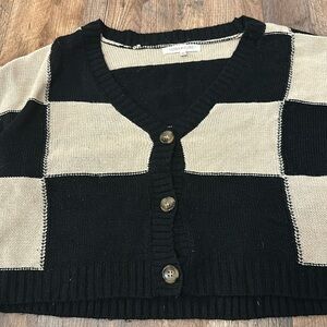 Doesn’t fit my closet anymore . Very cute styled it 1 time . Cropped sweater